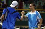 Verdens nummer 84 slog nummer 8, da Kristian Pless (tv.) sendte David Nalbandian ud af Chennai Open. 