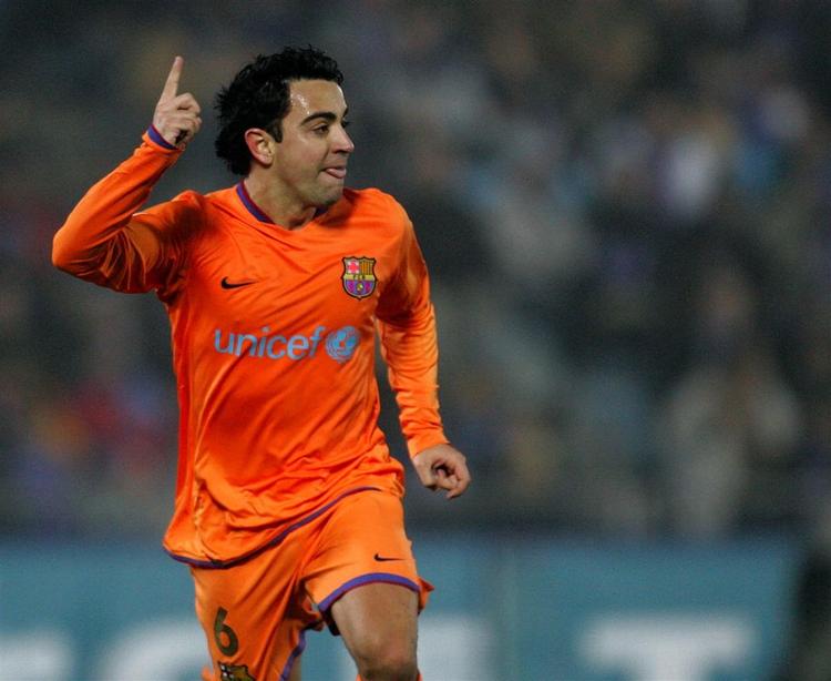 Xavi jubler efter at have sørget for den sene udligning i kampen mod Getafe. 