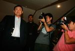 Den afsatte regeringschef Thaksin Shinawatra under et nyligt besøg i Hongkong. Foto: AP 