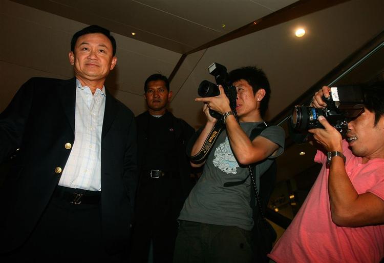 Den afsatte regeringschef Thaksin Shinawatra under et nyligt besøg i Hongkong. Foto: AP 
