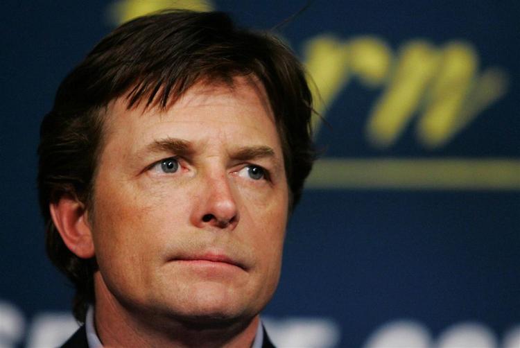 En forsker fra Institut for Medicinsk Biokemi på Aarhus har fået 750.000 kroner af skuespilleren Michael J. Fox. Universitet, 