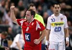 Lars Rasmussen, der her jubler efter en scoring, da Danmark mødte Tjekkiet søndag, kan sammen med holdkammeraterne se frem mod en finale næste søndag, mener Politikens netavis' læsere. 