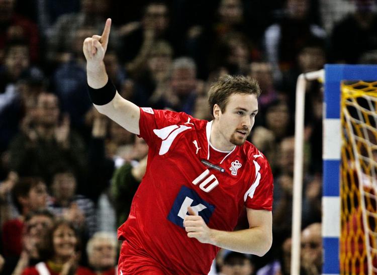 Lars Møller Madsen jubler her over en scoring mod Island under VM. 