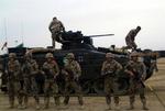 Tyske soldater på parade i den tyske lejr i Mazar-e- Sharif nord for Kabul. Der blev ikke givet tilsagn om flere NATO-tropper til Afghanistan på møde i Sevilla. 