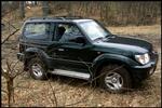 Benzinslugende og miljøbelastende biler som denne Toyota Landcruiser skal ikke længere være danskernes førstevalg i bil. Derfor skal prisen på grønne biler lempes. 
