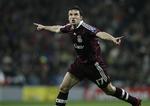 Van Bommel jubler efter den sene reducering på Bernabeu. 