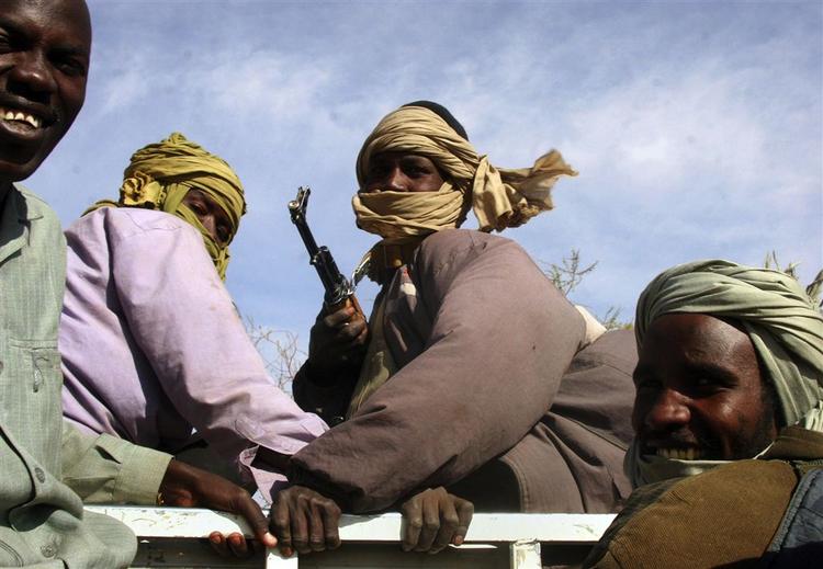 Den Internationale Straffedomstol nærmer sig at kunne tage fat på det juridiske opgør efter konlikten i Sudans Darfur-region. Her ses rebeller fra oprørsbevægelsen SLA. 