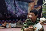 Bygningsarbejdere under en pause i hovedstaden Beijing 