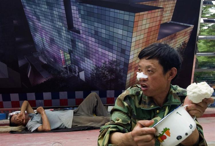 Bygningsarbejdere under en pause i hovedstaden Beijing 