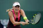 Caroline Wozniacki kæmpede forgæves mod sit store idol ved turneringen Indian Wells. 