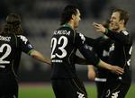 Daniel Jensen jubler sammen med Hugo Almeida over portugiserens sejrsmål i det første UEFA Cup-opgør mod Celta Vigo. 
