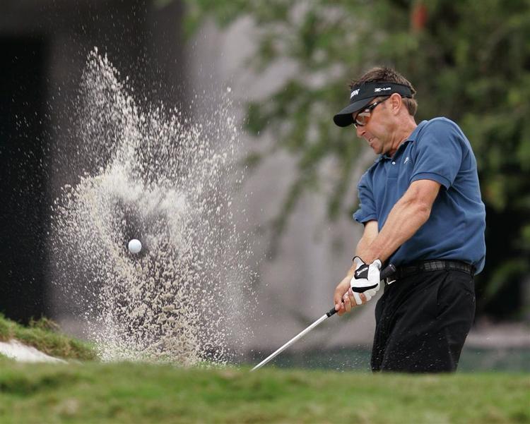 Australske Robert Allenby deler førstepladsen med Sveriges Henrik Stenson et slag foran Thomas Bjørn. 