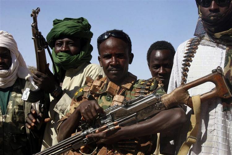 Fem fredsvagter fra Den Afrikanske Union blev søndag dræbt i et angreb. Senegal mener Sudans befrielseshær SLA (billedet) stod bag. 