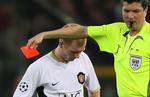 Allerede efter godt en halv time af onsdagens kvartfinale mod Roma havde Paul Scholes ifølge den tyske dommer Herbert Fandel gjort sig fortjent til et tidligt bad. 