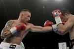 Mikkel Kessler(t.v.) i sit seneste titelforsvar mod Librado Andrade som danskeren vandt efter 12 hårde omgange. 
