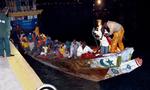 Båden med de 57 papirløse ved ankomsten til Gran Canaria. De står til at blive sendt tilbage til Mauretanien, hvor myndighederne har forsikret, at de vil blive retsforfulgt. 
