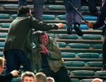Italiens politi i sammenstød med fans fra Manchester United under sidste uges kamp i Rom. UEFA beskylder Rom's politi for at være dårligt forberedt til opgaven. 