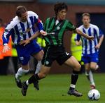 Celtic's Shunsuke Nakamura kæmper bravt. 