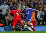 Daniel Agger i duel med Chelseas målscorer Joe Cole i den første semifinale for en uge siden. 