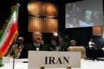 Den iranske udenrigsminister Mottaki under dagens konference i Irak. 