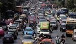 Trafikken i Bangkok, hvor en lang række FN-lande har taget hinanden i ed på at bekæmpe udledningen af CO2. 