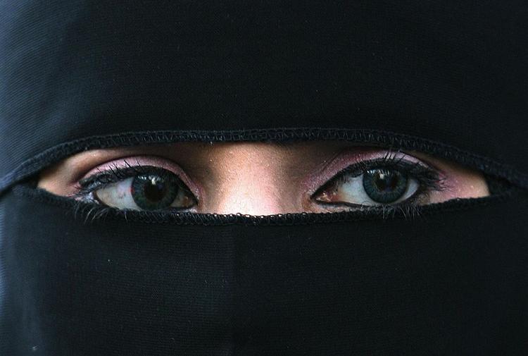 The niqab dress code used by some Muslim women allows only a small slit for the eyes. Archive photo. 