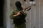 Hamas og Fatah bekriger hinanden trods regeringssamarbejde. Her en loyalist til sidstnævnte. 