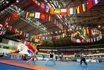 Kinas Zuo Yi(t.h.) mod Afghanistans Rouhullah Nekpa under Taekwondo VM i Changping Gymnasium i Beijing, hvor Philip Rayes tidligere søndag tabte kvartfinalen. 
