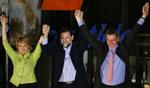 Konservativ jubel efter valget. På billedet ses Madrid-regionens præsident Esperanza Aguirre, Folkepartiets leder Mariano Rajoy og Madrids borgmester Alberto Ruiz Gallardon. 