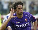 Luca Toni udfører sin egen helt specielle gestus, når han har scoret. 