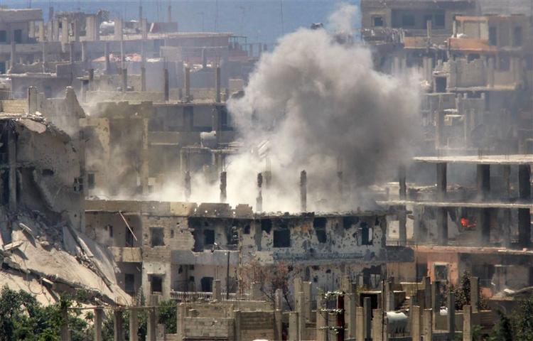 En bygning under angreb i Nahr al-Bared-lejren i Libanon. 