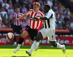 Obafemi Martins (th) blev beskudt i Nigeria. 
