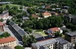 Fristaden Christiania, som den tager sig ud fra toppen af Vor Frelser Kirkes tårn. Måske er der en slags ro på vej? Foto: Jonathan Bjerg Møller 
