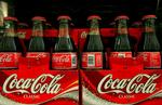 EARNS COCA COLA