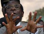 Præsident Robert Mugabe har ikke nogen heldig hånd med sit lands økonomi. 