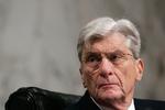 Den højtstående republikaner John Warner vil have de amerikanske tropper ud af Irak. 