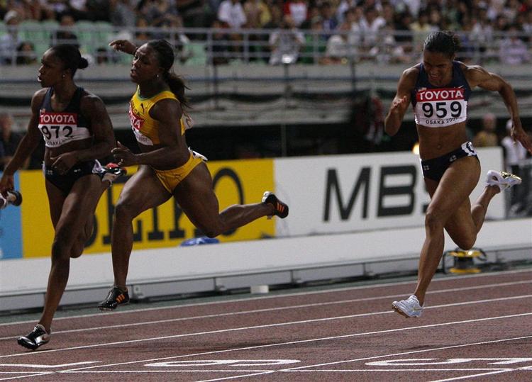 Campbell (i gult) er verdensmester på 100 meter. 