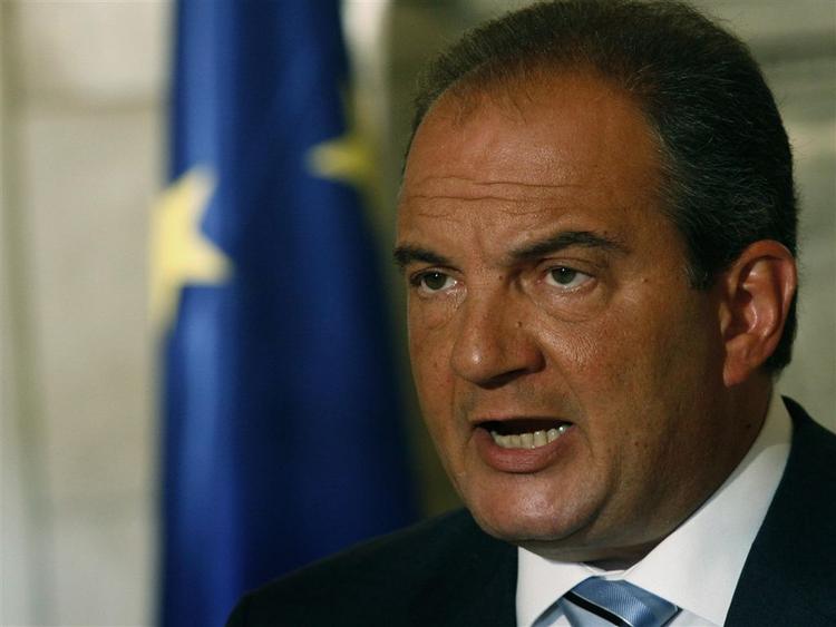 Ministerpræsident Karamanlis er kommet i ilden efter skovbrande. 
