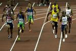 Tyson Gay sender Leroy Dixon afsted på de sidste 100 meter yderst til højre. 
