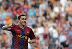 Xavi Hernandez gjorde det til 3-0 i Barclonas sejr over Atletico Madrid. 