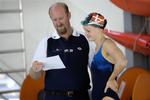 Mark Regan - her med sprinteren Anette Hansen - har et løfte at opfylde efter Lotte Friis svømmede imponerende stærkt i 400 meter fri. 