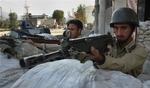 Pakistanske paramilitære styrker i Swat-distriktet, hvor myndighederne fandt ligene af fire henrettede sikkerhedsfolk. 