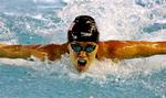 Natalie Coughlin svømmede en stærk 100 meter butterfly, dagen inden hun satte verdensrekord i 100 meter rygcrawl. 