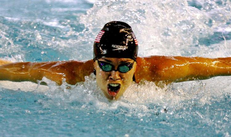 Natalie Coughlin svømmede en stærk 100 meter butterfly, dagen inden hun satte verdensrekord i 100 meter rygcrawl. 