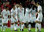 Tpttenham-spillere jubler over en scoring mod Hapoel Tel Aviv i forrige runde af UEFA Cup-spillet. 
