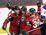 Minnesota Wild spillere jubler i en NHL-kamp for nyligt mod St. Louis Blues. Danske Morten Madsen håber, han får mulighed for at trække i Minnesota-trøjen i løbet af sæsonen. 