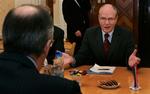 Ruslands udenrigsminister Sergey Lavrov lytter til Goran Lennmarker, formand for OSCE's generalforsamling. 