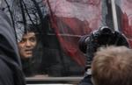 Kasparov i en politibus efter anholdelsen i eftermiddag i Moskva. 