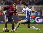 I kampen mod Espanyol måtte Barcelonas stjerne Ronaldinho lide den tort at sidde på bænken i begyndelsen af opgøret. 