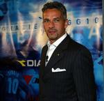 Aung San Suu Kiy er buddhist. Det samme er Roberto Baggio, og derfor er han udpeget til at modtage en italiensk fredspris på vegne af den burmesiske oppositionsleder. 